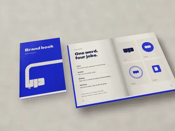 Our brand book, open at the page that shows the mark's four jobs